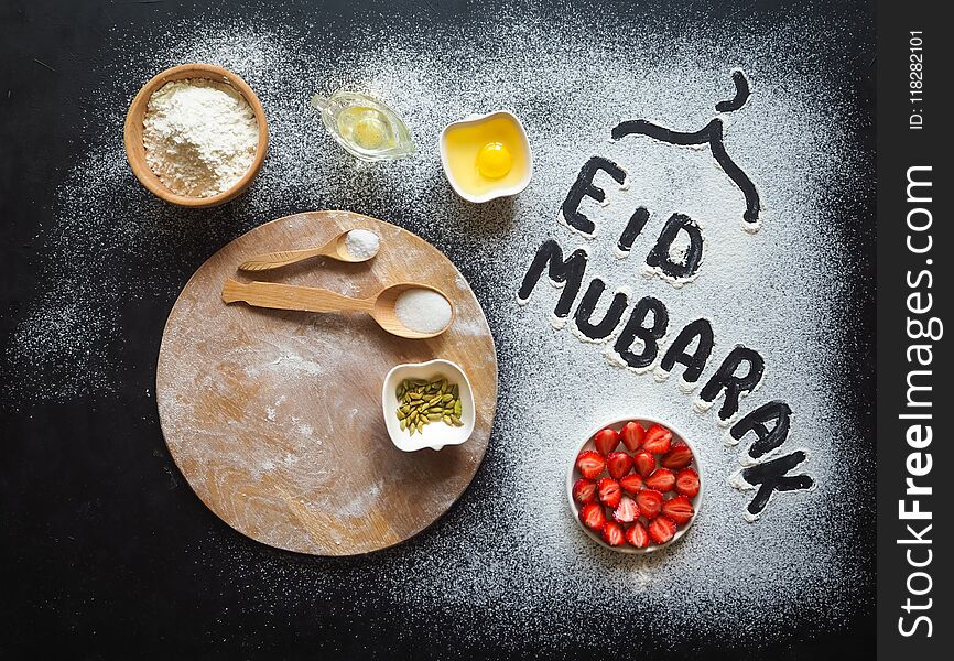 Eid Mubarak - Islamic Holiday Welcome Phrase ` Happy Holiday`, Greeting Reserved. Strawberry Open Cake. Arabic Cuisine Background.