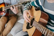 Learning To Play The Guitar. Music Education. Royalty Free Stock Photography