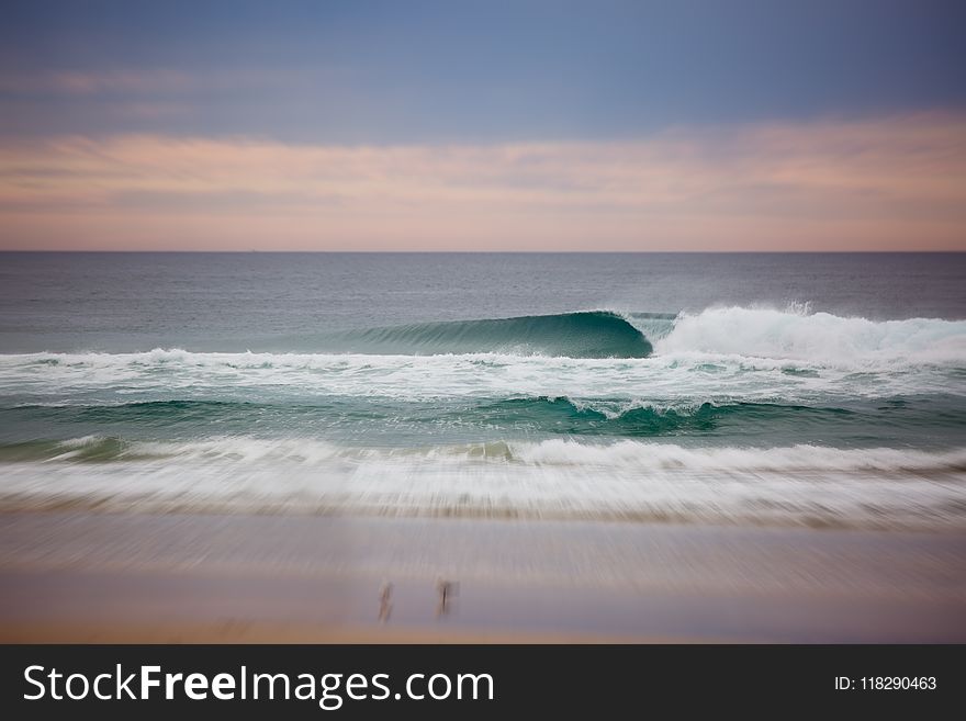 Scenic View of Ocean During Dawn