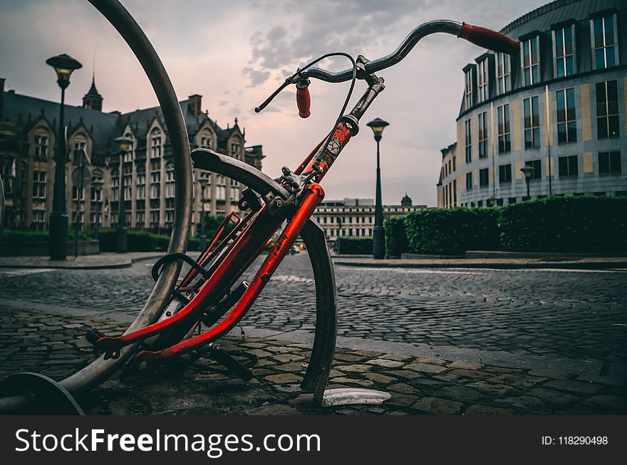 Close-up Photography Of Red And Black Road Bike Frame