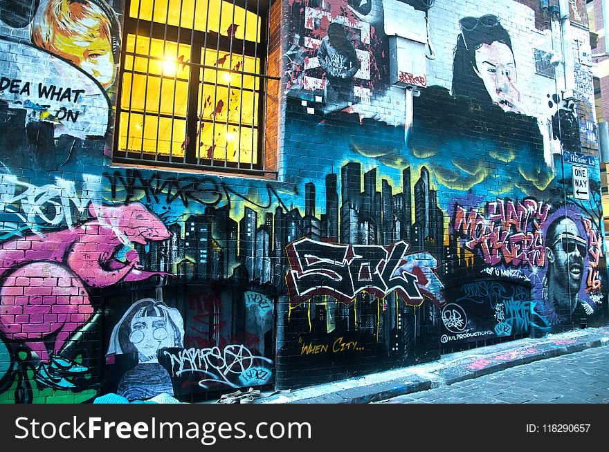 Photography of Graffiti on Brickwall