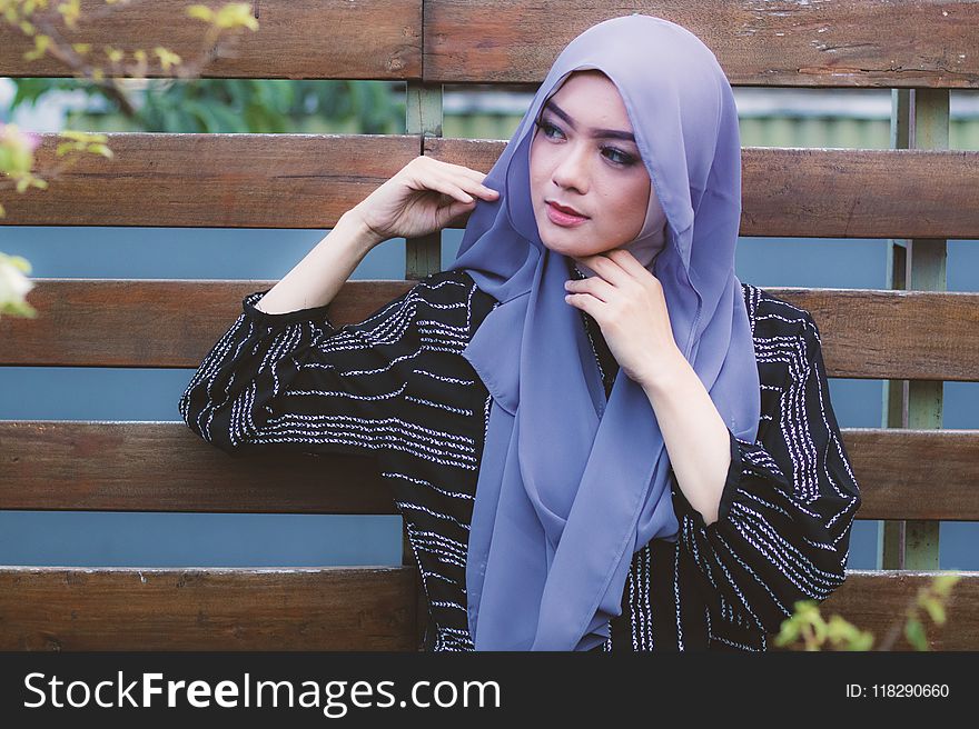 Photography of a Woman Wearing Blue Hijab