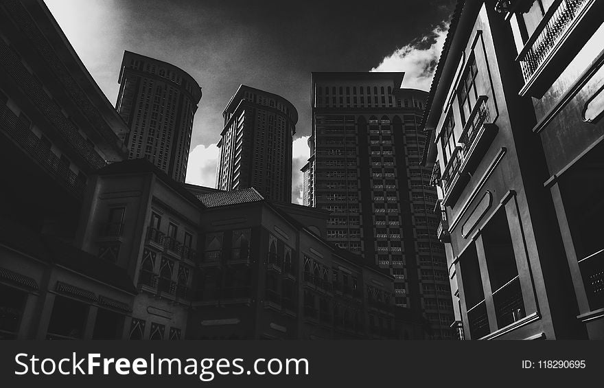 Grayscale Photo Of Concrete Building