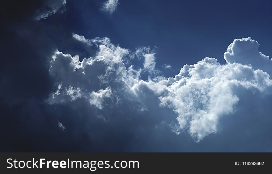 Nature background, blue sky with clouds close-up