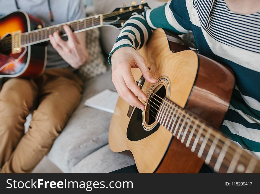 Learning To Play The Guitar. Music Education.