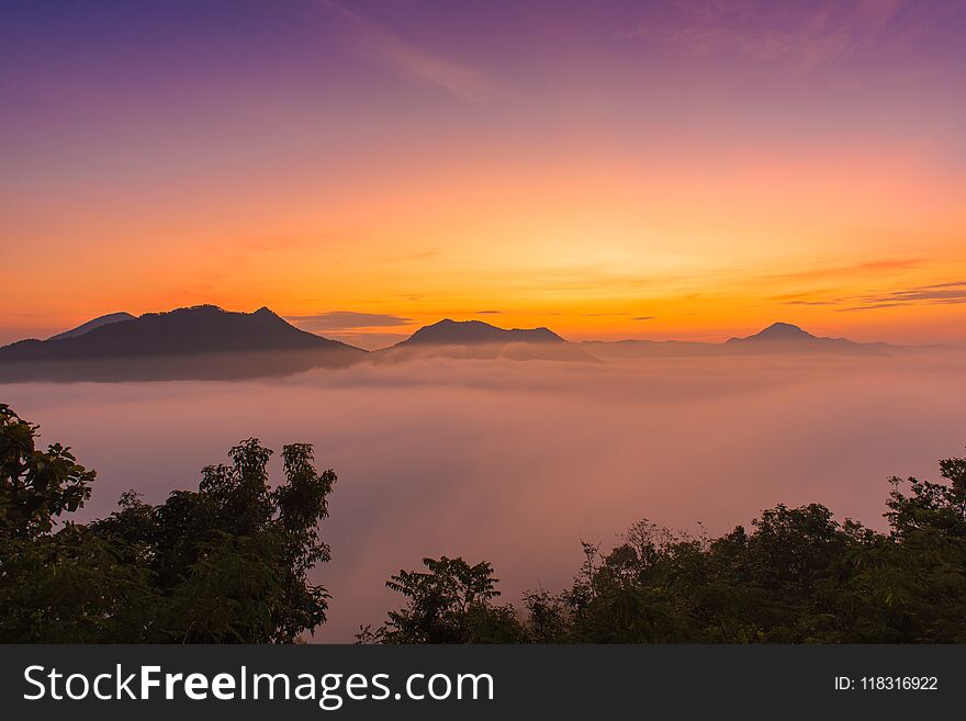 Mountains Under Mist In The Morning With Sunrise At Phutoke Loei Thailand