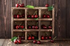 Fresh Cherry With Water Drops On Rustic Wooden Background. Fresh Cherries Background. Healthy Food Concept Stock Photography