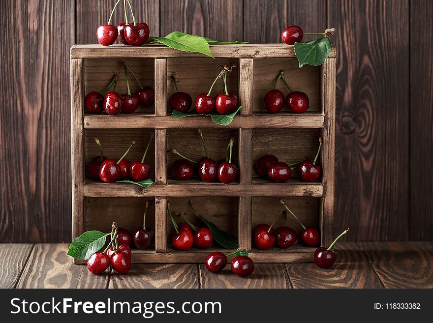 Fresh Cherry With Water Drops On Rustic Wooden Background. Fresh Cherries Background. Healthy Food Concept