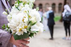 Bride And Groom Holding Wedding Bouquet Stock Photography