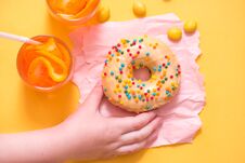 Donut On Yellow Background. Top View. Copy Space. Stock Photo