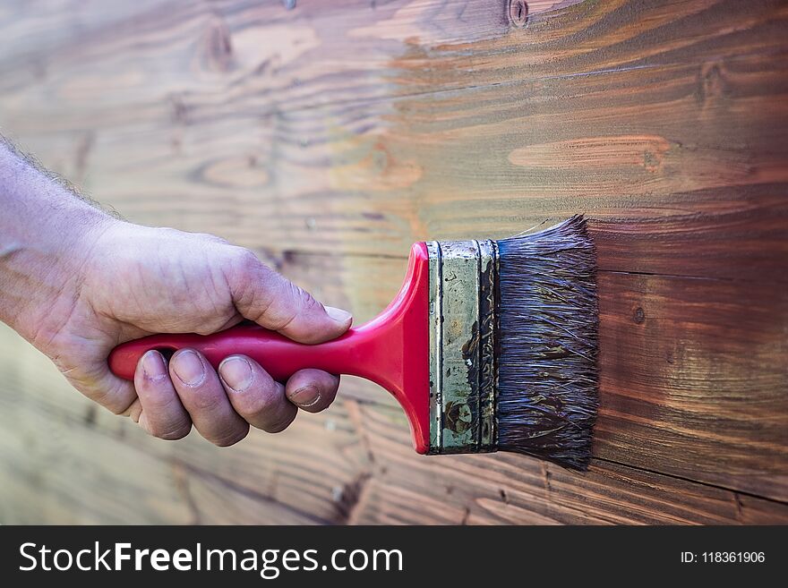 Paintbrush on wood - brush on wooden texture paintbrush on wood - brush on wooden texture