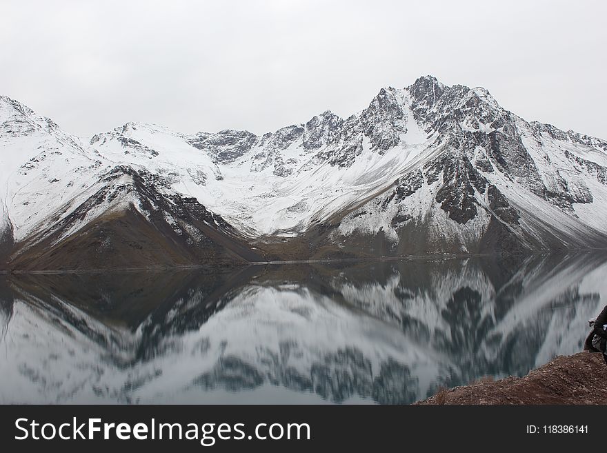 Mountain Covered With Snow Near Lake Landscape Photography