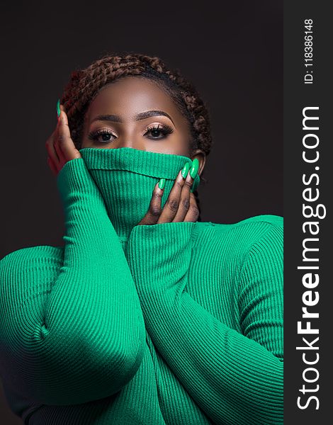 Woman Wearing Green Rib Turtleneck Sweater