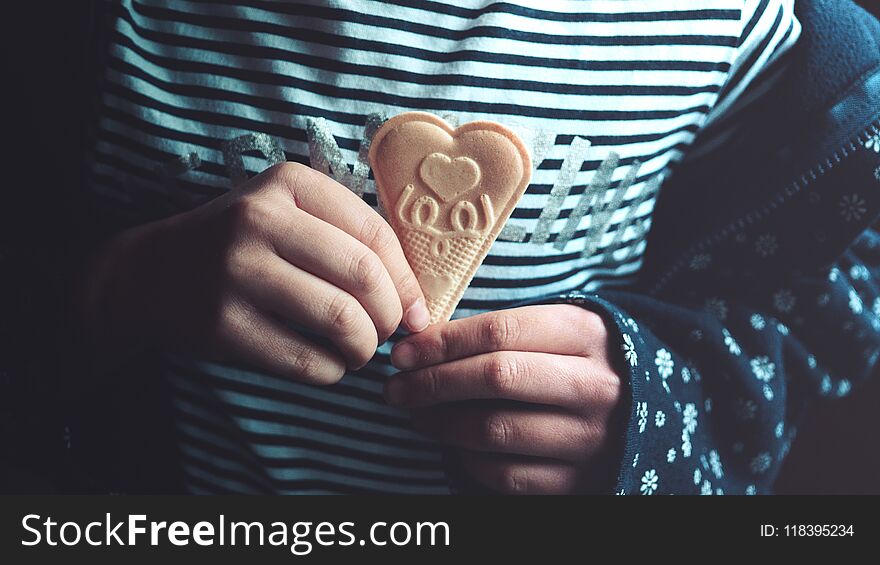 Girl holding ice cream waffle in hands. Girl holding ice cream waffle in hands