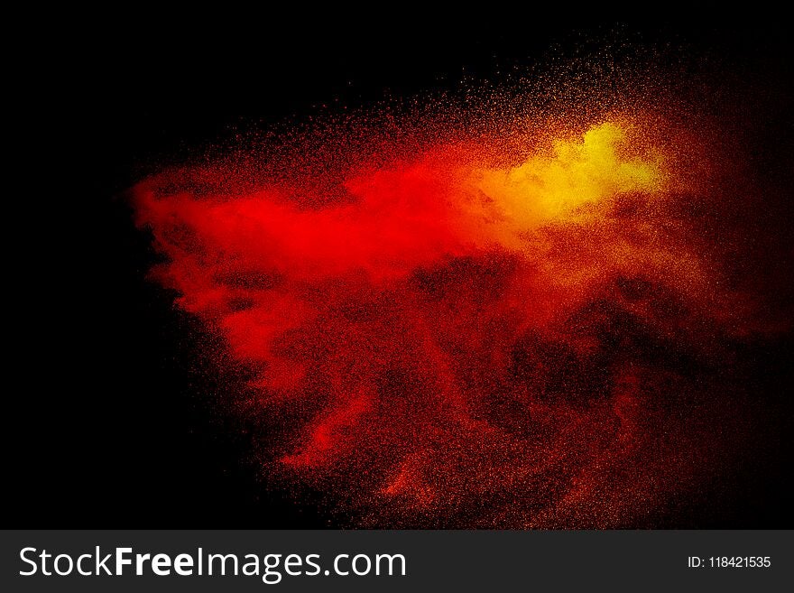 Red Powder Explosion On Black Background.