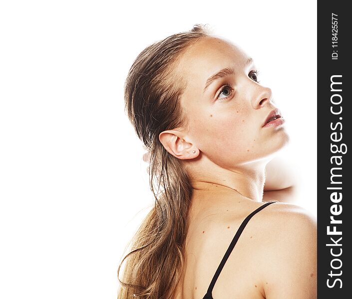 Young attractive woman wet long hair after workout isolated on white