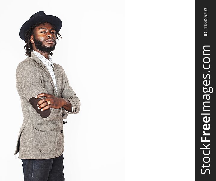 Young handsome afro american boy in stylish hipster hat gesturing emotional isolated on white background smiling, lifestyle people concept close up