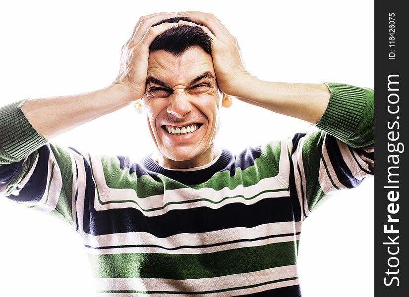 Portrait of a smart serious young man standing against white background. Emotional concept for gesture close up