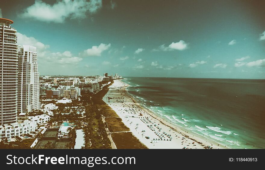 Amazing aerial view of Miami Beach and coastline at sunset, Florida.