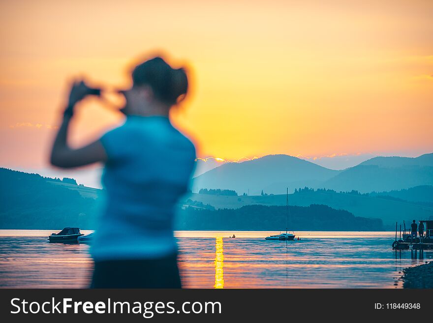 Liptovska Mara lake with the Tatra Mountains in the background. Autumn sunset. Liptovska Mara lake with the Tatra Mountains in the background. Autumn sunset.