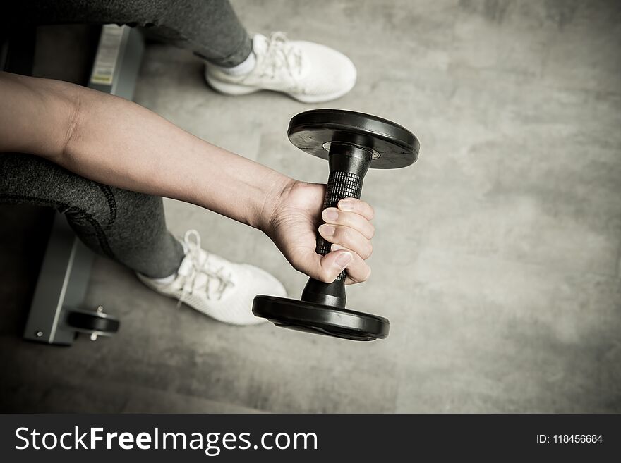 Weight-lifting and exercise in fitness, healthy sport, fit and firm