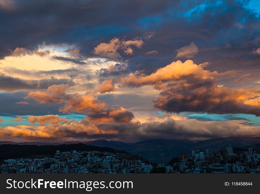 Spectacular sky with clouds of various colors, over the city of