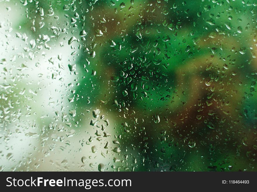 Close-Up Photography of Droplets on Glass