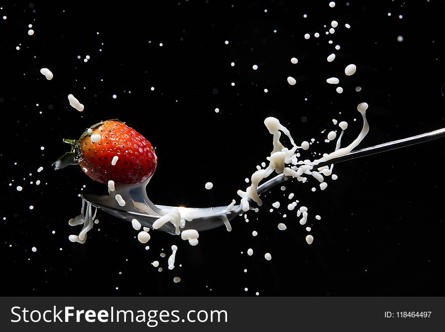 Close-Up Photography of Strawberry on Spoon