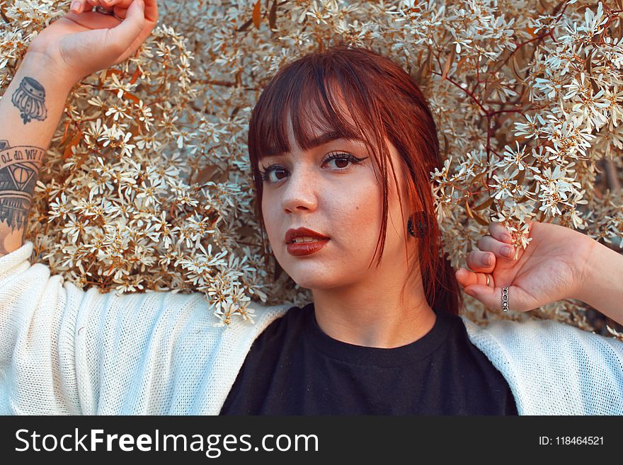 Shallow Focus Photography of Woman in Black Shirt