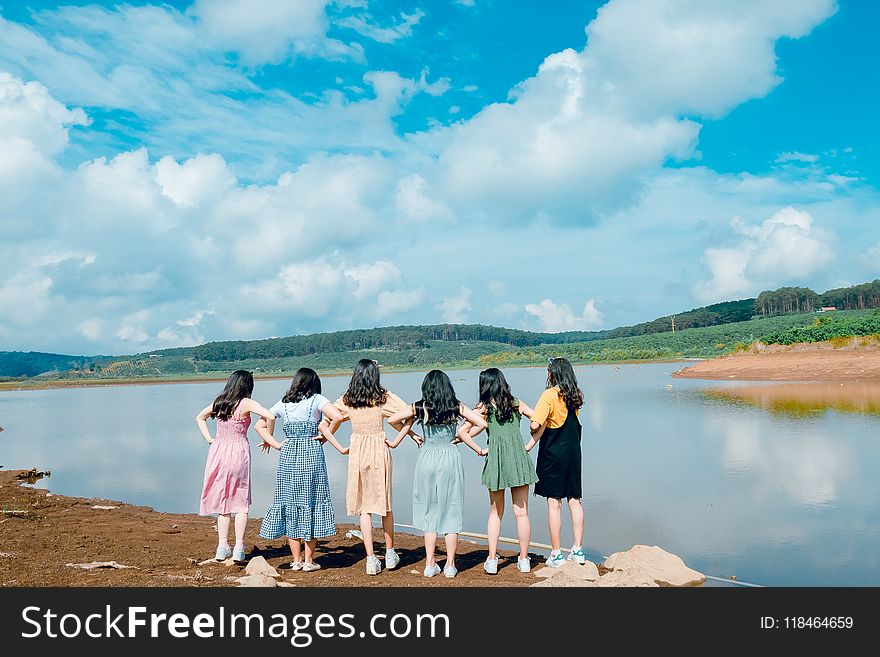 Six Girl&#x27;s Standing in Front of Lake