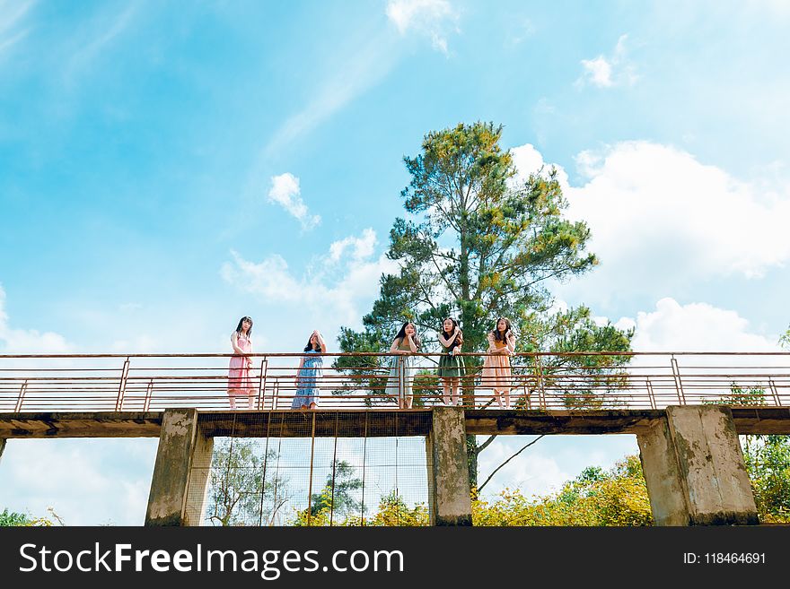 Landscape Photography of People on Bridge