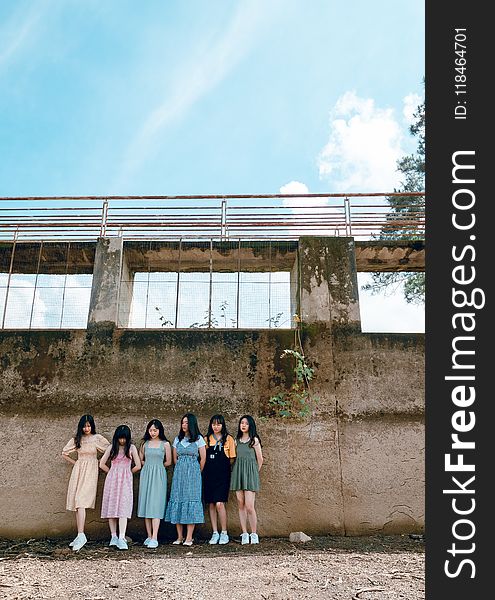 Six Girls on Leaning on Walls