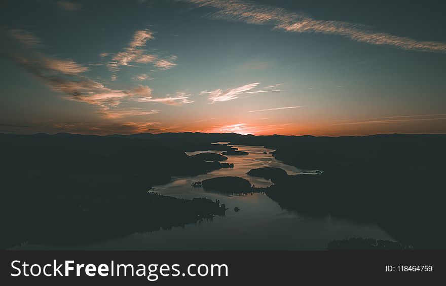 Silhouette Of Body Of Water