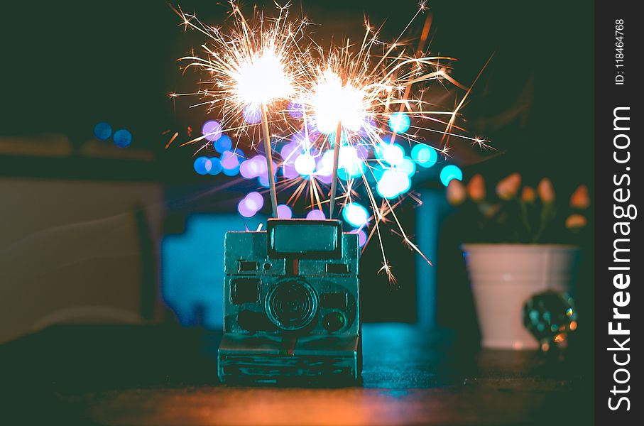 Polaroid Camera And Fireworks