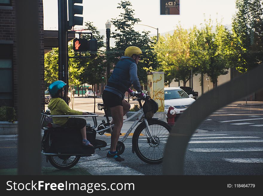 Person Riding Bicycle On Street
