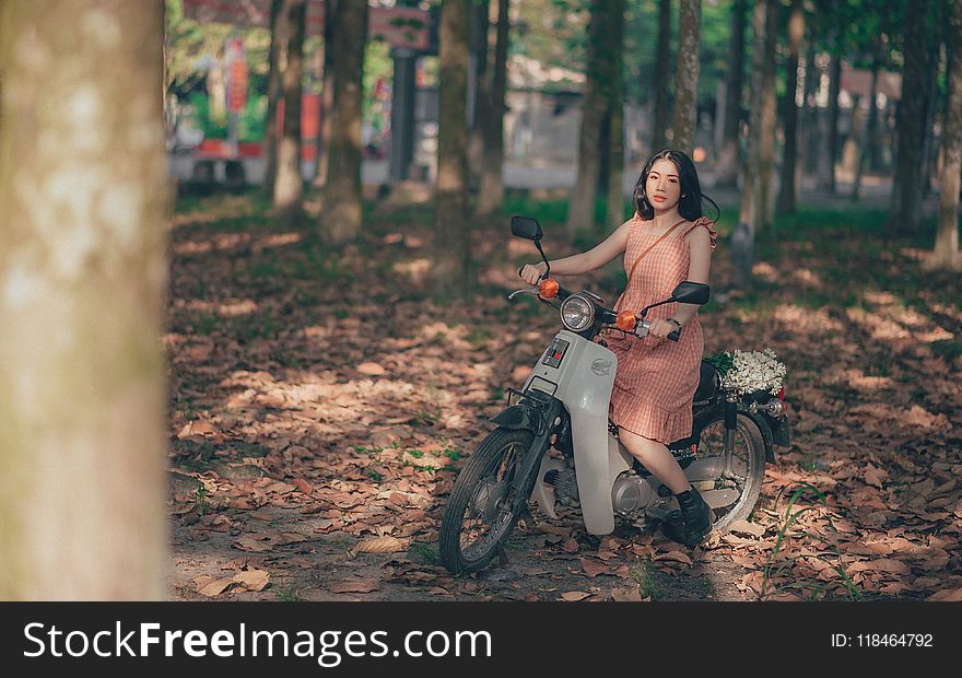 Woman Riding Motorcycle