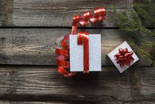 Christmas, New Year. White, Gift Box, Red Ribbon, Wood Background, Top View, Vintage, Space For Text. Online Delivery Stock Photography Christmas, New Year. White, Gift Box, Red Ribbon, Wood Background, Top View, Vintage, Space For Text. Online Delivery Stock Photography