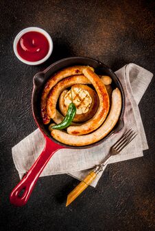 Grilled Sausages In Pan Royalty Free Stock Photography