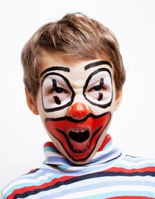 Little Cute Boy With Facepaint Like Clown, Pantomimic Expressions Close Up Stock Photos