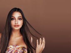 Cute Happy Young Indian Woman In Studio Close Up Smiling, Fashion Mulatto Beauty Royalty Free Stock Photography