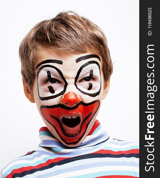 Little cute real boy with facepaint like clown, pantomimic expressions close up