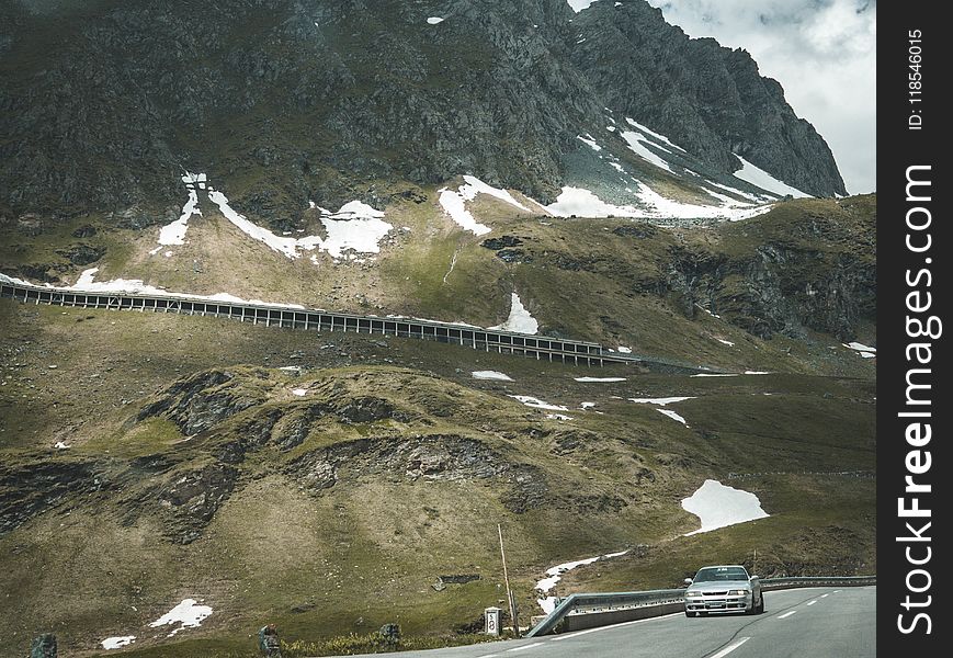 Silver Car On Road Near Mountain At Daytime