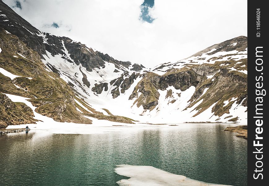 Snowy Mountain and Body of Water