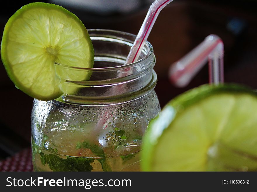 Close-up Photo Of Clear Glass Mason Mug With White Liquid