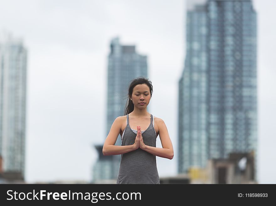 Shallow Focus Photography Of Woman Doing Yoga