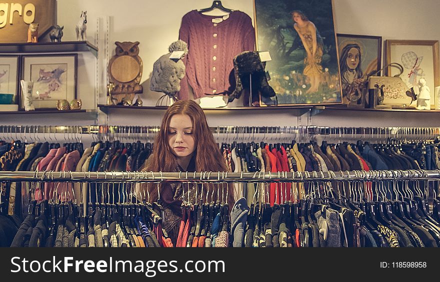 Photo of Woman Near Clothes