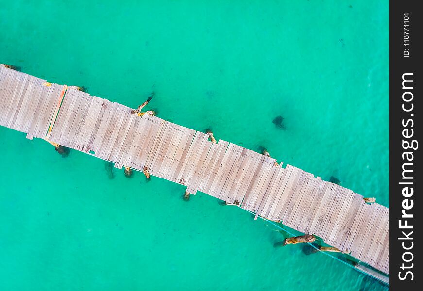 Aerial view of pier with sea and ocean for travel and vacation