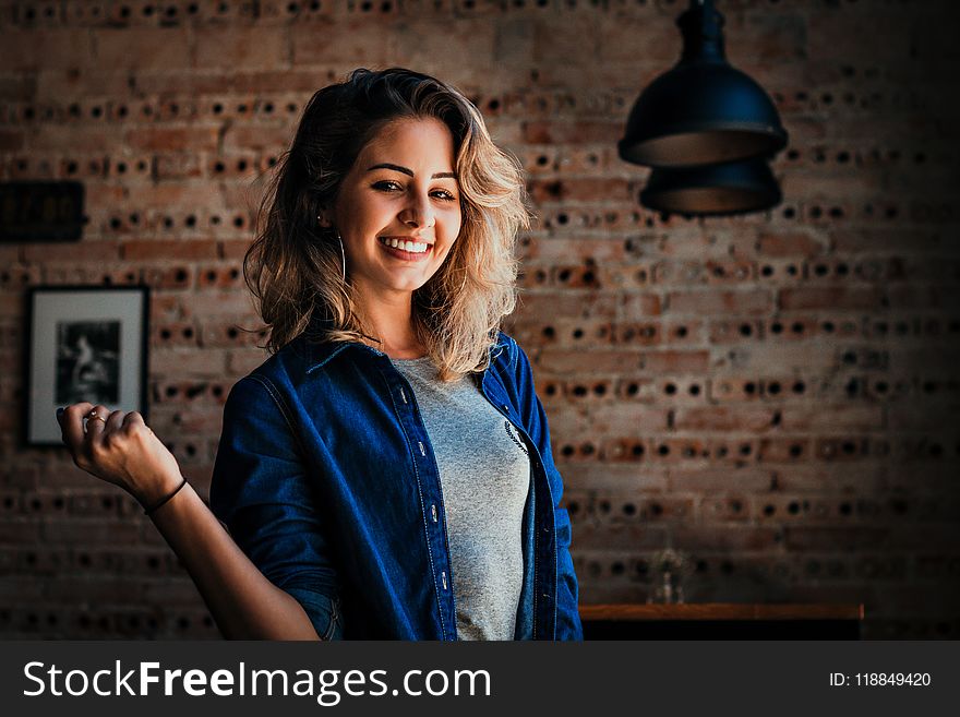 Woman Wearing Blue Button-up Jacket