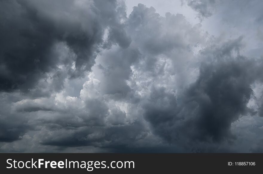 Dark storm clouds before rain used for climate background. Clouds become dark gray before raining. Abstract dramatic background.