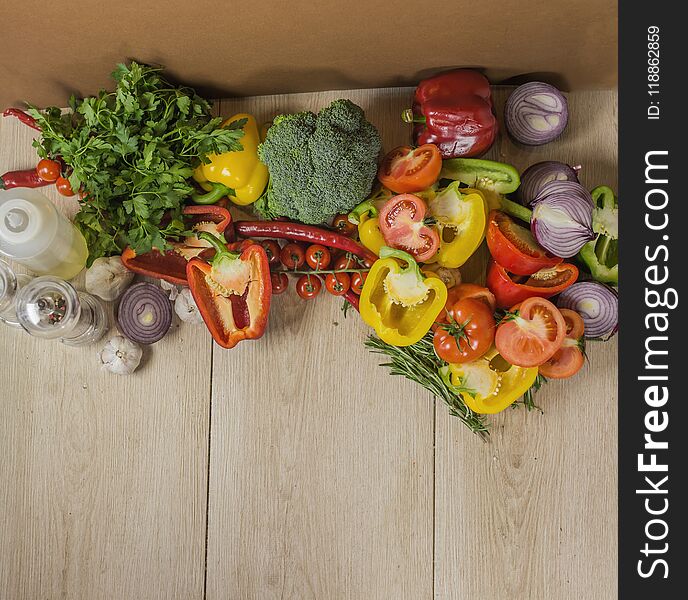 Wooden Background With Organic Vegetables On The Side, Top View